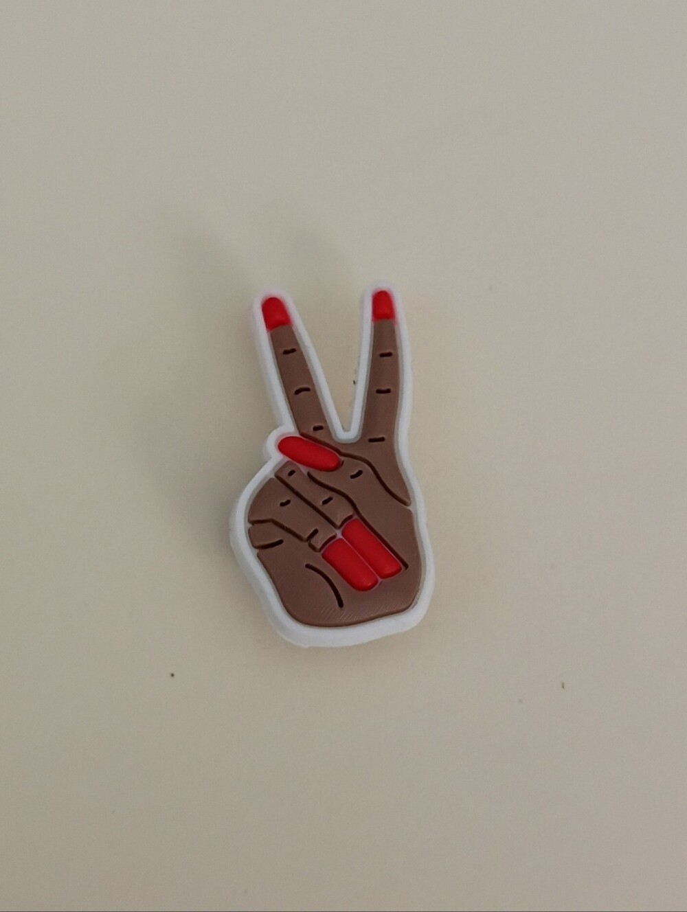 10 for $10 Jibbitz Croc Charm - Red Nails On Woman's Hand In Peace Sign Symbol